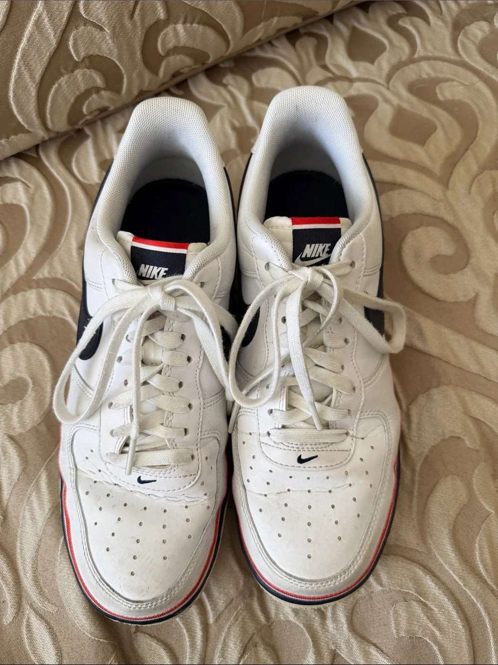Nike Men’s White Sneakers with Navy Swoosh & Red Trim